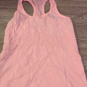 lululemon Women’s knit tank top size 4 Coral Orange color racer back